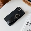 Detail of black matte iPhone case with cross-texture wrist strap and triangle metal buckle - Black / iPhone 7/8/SE 2020