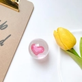 Pink heart-shaped crystal grip tok phone stand shown with a yellow tulip on white background - Rose Red