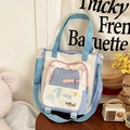 Bolso tote de lona en contraste con bordado Happy Days y correa de hombro ajustable - Azul