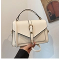 Chic off-white litchi grain leather handbag with vintage gold buckle and top handle - White