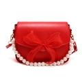 Red crossbody bag with translucent organza bow and white pearl handle strap - Red
