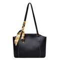 Minimalist black leather tote bag with white contrast stitching and floral scarf accessory - Black