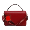 Chic red faux leather crossbody bag with black handle and gold chain strap - Red