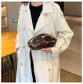 Detail of dark brown irregular liquid-shaped acrylic clutch bag with gold chain strap - Gunmetal