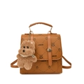Minimalistische karamel lederen rugzak met cartoonpatronen en een pluche hondenhanger - Bruin Met Hanger