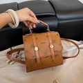 Brown vintage backpack with cartoon animal print and pebbled faux leather texture - Brown No Pendant