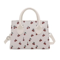 Chic cream tote bag with cherry print, dual top handles and adjustable shoulder strap - White