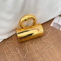Sac à main cylindrique doré élégant avec finition miroir et poignée sculpturale - Or Foncé