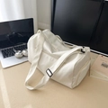 White large capacity travel duffel bag with adjustable strap for sports and commuting - Off White