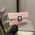 Minimalist light pink suede envelope clutch with a bold black square buckle accent - Pink