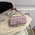 Elegant lavender square crossbody bag with gold horseshoe buckle and knotted strap - Purple