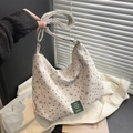 Off-white corduroy hobo bag with brown bow prints and a wide shoulder strap - No Pendant / Off White