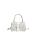 Minimalist beige crossbody bag with gold D-buckle and abstract letter patterns - White