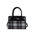 Fashionable women's plaid leather handbag with top handle and metal buckle closure - Black