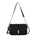 Retro black matte shoulder bag featuring a unique golden peanut-shaped buckle on white background - Black