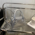 Bolso de mano plateado metalizado en cuero sintético con asas y letras de moda - Plateado