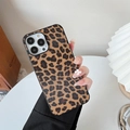 Detail of leopard print phone case with cross-grain texture held in hand for iPhone - Samsung S8 / Yellow Leopard