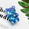Dettaglio del supporto per telefono a forma di orso con glitter blu-viola sfumati - Blu Reale