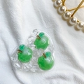 Macro detail of a heart-shaped resin phone socket with green apples and ice cubes - Ice Fruit - Green Apple