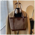 Brown tote bag with cute cartoon bear embossing shown in a cozy home setting decor - Coffee No Pendant