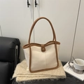 Elegante borsa a secchiello in ecopelle crema con finiture marroni e tracolla lunga - Stile Semplice / Bianco