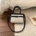 Minimalistische Canvas-Beuteltasche mit Lederbesatz und Umhängegurt für den täglichen Weg - Schwarz
