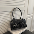 Glossy black pillow bag with bow-knot pockets and long shoulder straps for women - Black