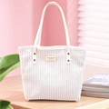 Minimalist white corduroy tote bag with leather strap and fashion branding for daily use - White