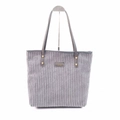 Minimalist grey corduroy tote bag with leather handles and metallic rivet details - Gray