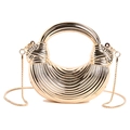 Elegant gold acrylic evening bag with striped texture and round metal handle - Gold