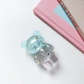 Detail view of transparent gradient blue resin bear phone grip with gold foil flakes - Gold Foil Bear Stand - Spliced - Transparent Blue Pink