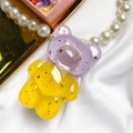 Close-up of bear phone stand with gold foil glitter and elegant pearl chain accessory - Gold Foil Bear-Stitched-Purple Yellow