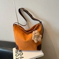 Grote oranje suède shopper met bruine leren bies en een schattige hondenbedel - Met Hanger / Bruin