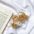 Detail of glitter bear phone grip with gold foil flakes on aesthetic white fabric - Gold Foil Bear-Contrasting-Coffee White