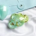 Macro shot of green cloud phone grip with gold foil flakes on white silk fabric - Gold Foil Cloud-Stitched-Double Green