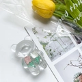Detail of transparent bear phone grip with internal pink and white floral resin patterns - Bear Stand - Pink & White Flower