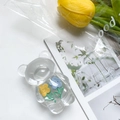Detail of transparent bear phone socket with cute smiling flower resin accessories - Bear Stand - Yellow & Blue Flower