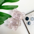 Dettaglio del supporto per telefono a forma di orso in resina con glitter rosa e argento - Rosa trasparente