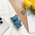 Blue 3D bear collapsible phone grip holder attached to a white smartphone - Ink Blue