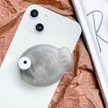 Translucent gray fish-shaped expandable phone grip with 3D eyes on a white smartphone - Gray