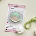 Iridiscent fish-shaped folding phone grip with holographic finish on aesthetic display - Magnetic Matte Taiyaki / Colorful Laser