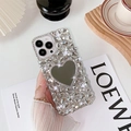 Close-up of luxury rhinestone iPhone case featuring a heart-shaped makeup mirror back - Heart Mirror Style / iPhone 7/8/SE 2020