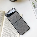 Detail of luxury glitter case for Samsung Z Flip3 with sequins on a book background - Samsung ZFlip3 / Small Checkered Black