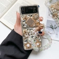 Coque luxe Samsung Z Flip avec strass, perles, breloques parfum et dragonne chaîne - Coque Rigide - Flacon de Parfum Entièrement Diamanté Avec Chaîne Laser / Samsung ZFold3