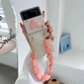 Clear case for Samsung Galaxy Z Flip3 with pink 3D heart and beaded wrist strap - Pink / Samsung ZFlip3