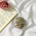 Silver metallic wave pattern phone grip on a white silk background with roses - Striped Round (600706) / Silver