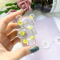 Support de téléphone ours transparent avec fleurs séchées jaunes et finition résine - Jaune