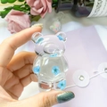 Support de téléphone ours en résine transparente avec fleurs séchées bleues chic - Bleu