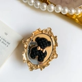 Vintage vergoldete Handyhalterung mit schwarzem Steppbär-Detail und Reliefrahmen - Goldrahmen Schwarzer Bär (Schwarz)