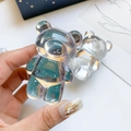 Soporte de oso para móvil en resina transparente con acabado brillante y diseño plegable - Oso Espejo